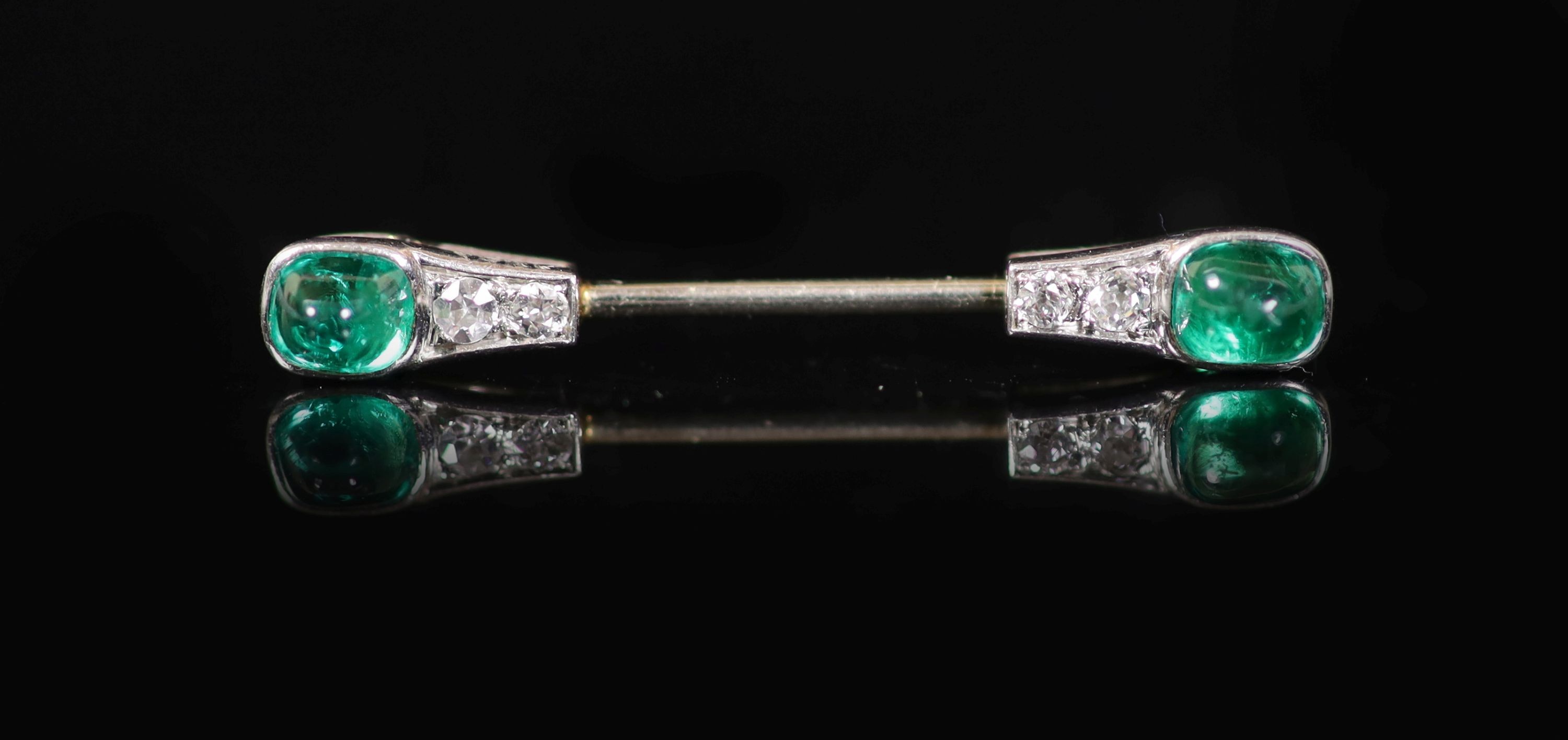 A 1930's/1940's French Cartier platinum, two stone cabochon emerald and four stone diamond set small jabot pin